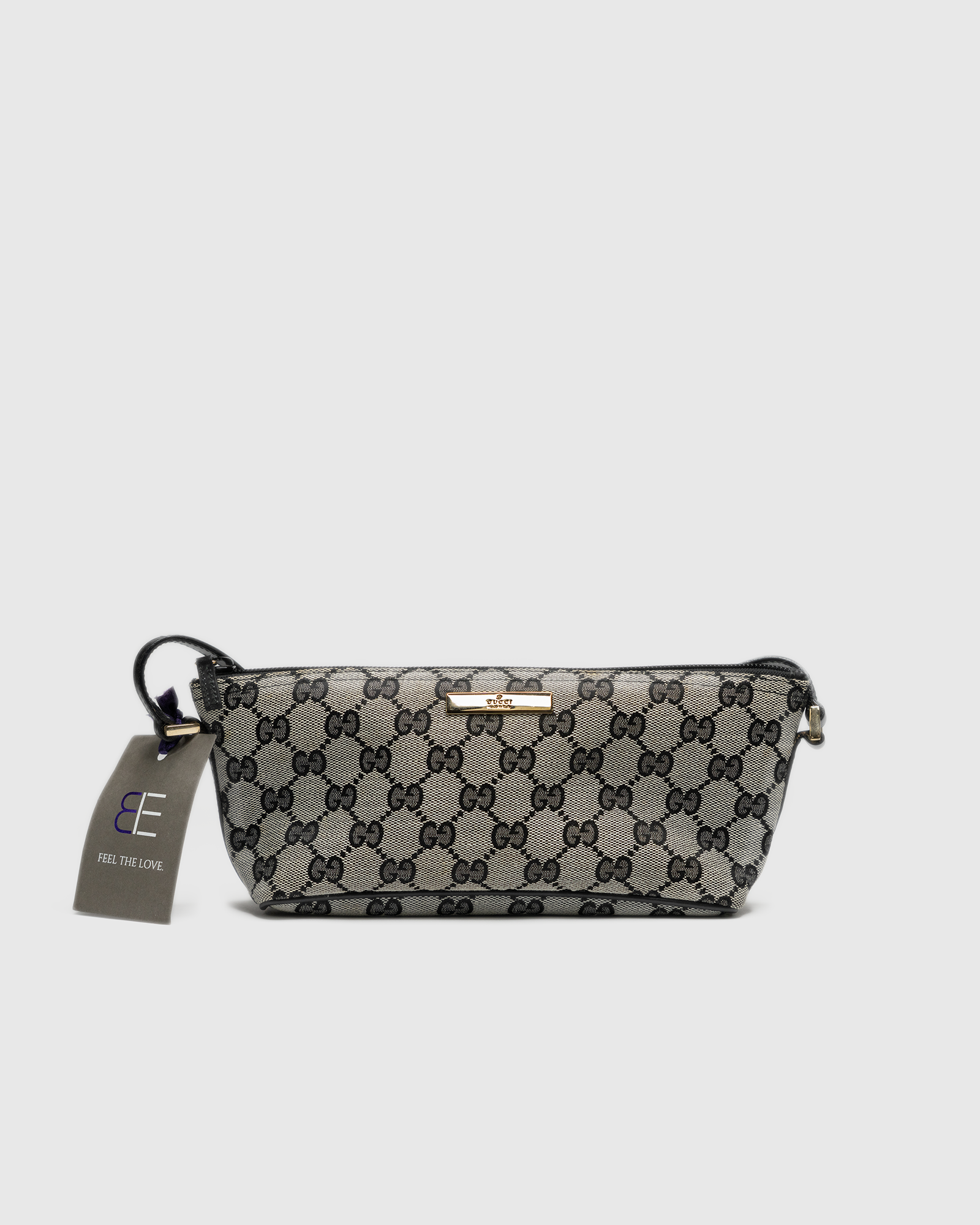 Gucci Monogram Canvas Clutch