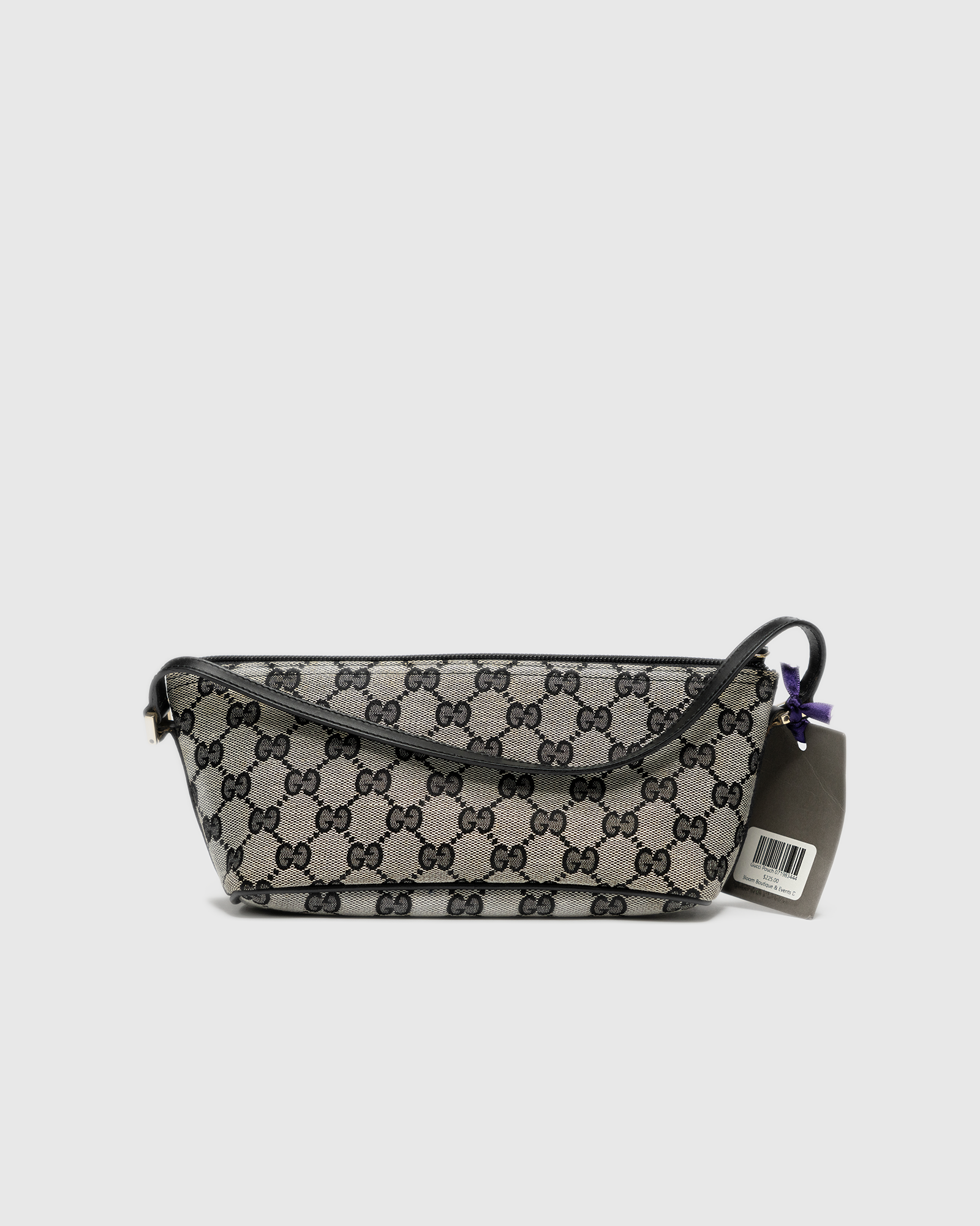 Gucci Monogram Canvas Clutch